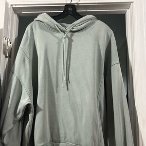 Woman’s Light Green Hoodie Sweater